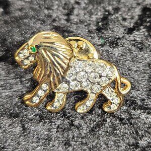 Gold toned bejeweled Lion Pin